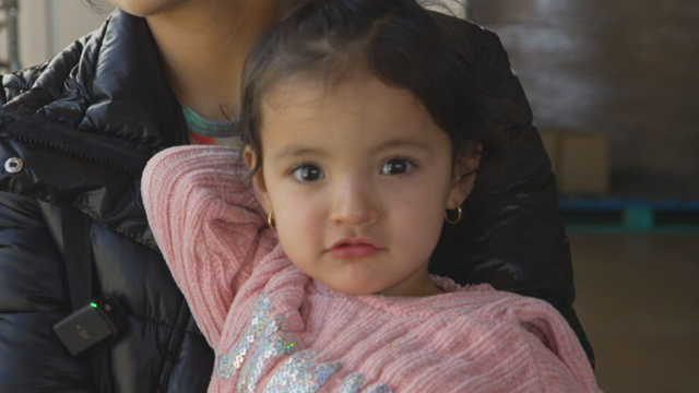 girl-at-food-distribution.png 